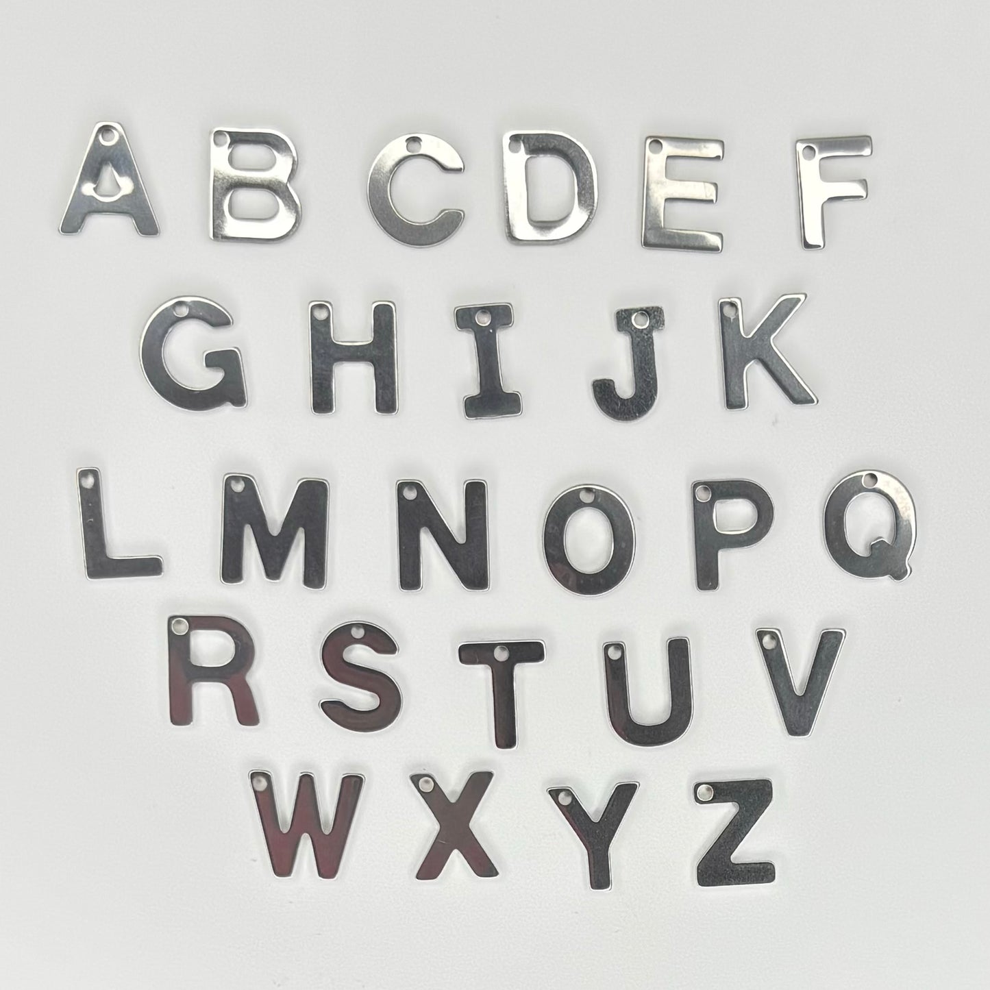 Dijes de letras