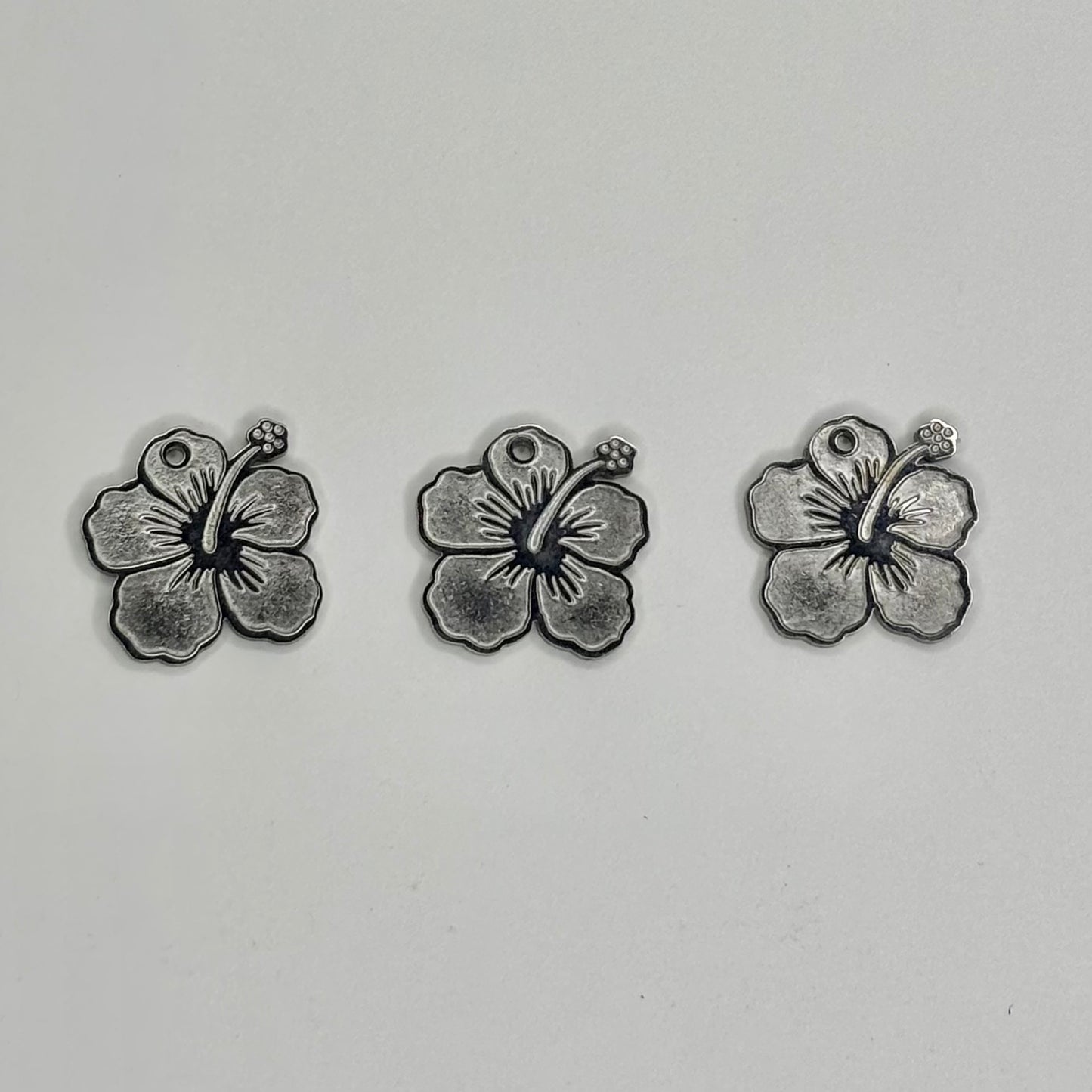 Dije de flor maga