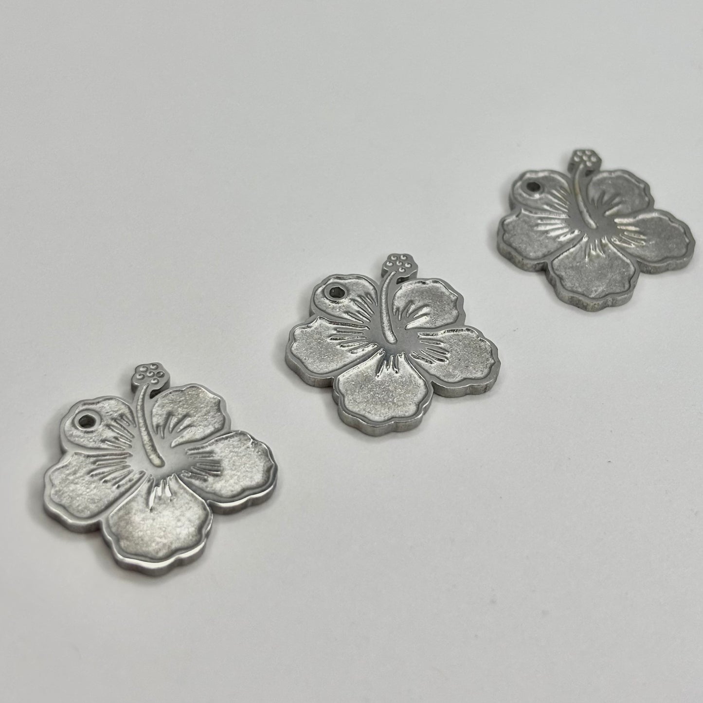 Dije de flor maga