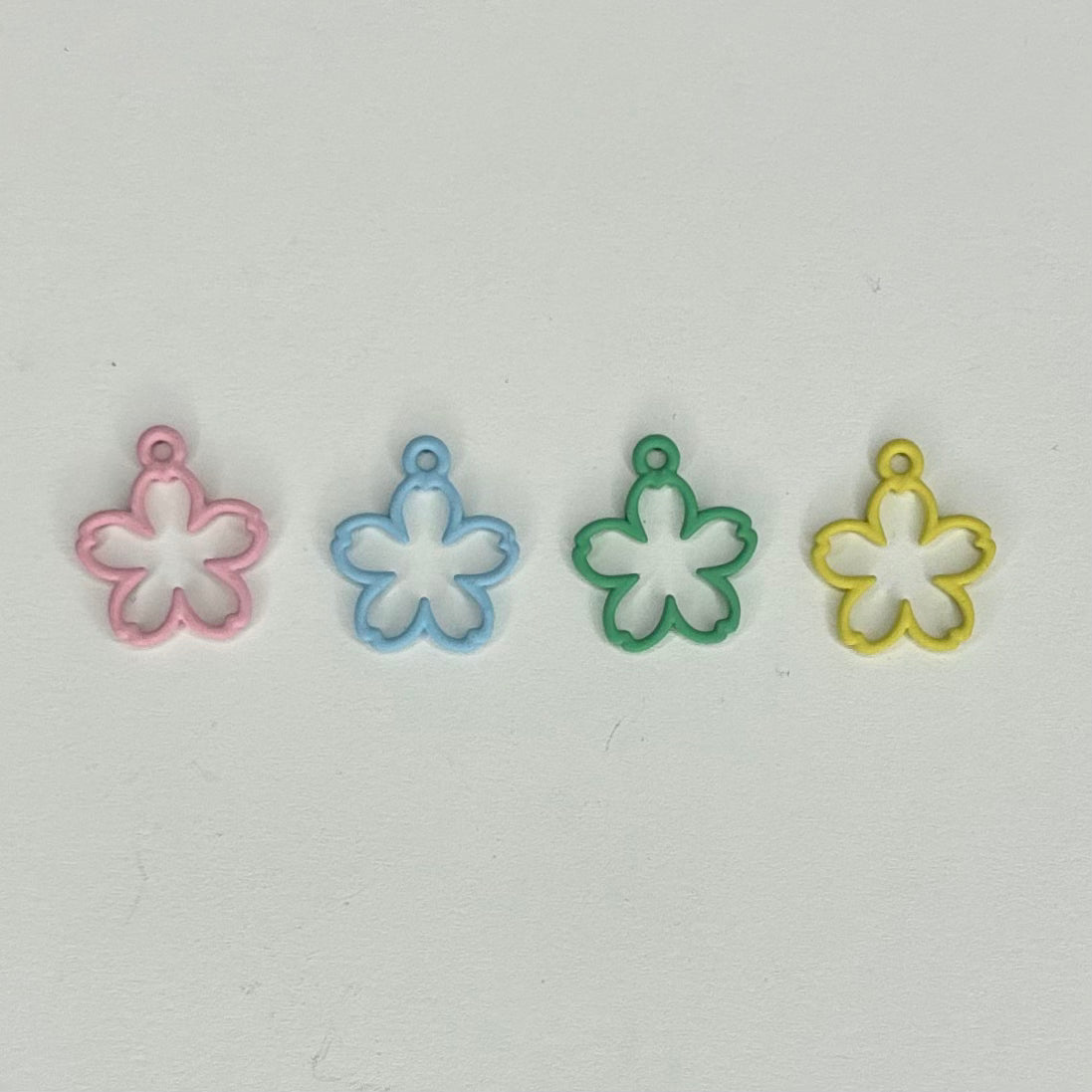 Dije de flores de colores